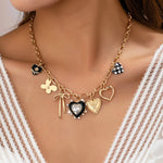 CHARM NECKLACE-BOW CHECKER HEART RHINESTONE | 80N92728